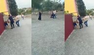 Hapis cezasıyla aranan şahsı yakalayan polislere taşla saldırdılar, o anlar kamerada