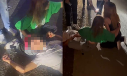 Ağır yaralı arkadaşını dizine koyup bekledi