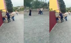Hapis cezasıyla aranan şahsı yakalayan polislere taşla saldırdılar, o anlar kamerada