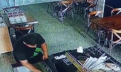 Topallayarak girdiği restorandan cüzdan çaldı
