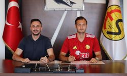Talha Es-Es'e imza attı
