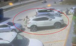 Park halinde hareket eden aracı tek eliyle durduran kadın faciayı önledi