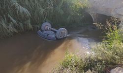 Kanala devrilen araçtaki baba ve oğlu boğuldu