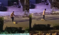 Otostop çektiği araçların durması için yola taş koydu