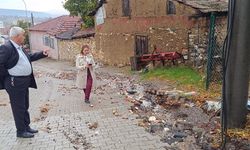 Komşuda sağanak yağış sonrası temizlik