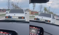 Bir otomobil tartıştığı sürücünün önünü kesti
