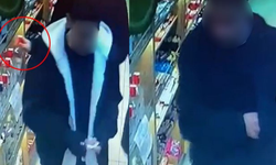 Eskişehir'de ilginç hırsızlık: Kalabalığı fırsat bildi alkollü içeceği cebine attı!