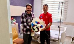 Dünya şampiyonu Erkan Balk'a geçmiş olsun ziyareti