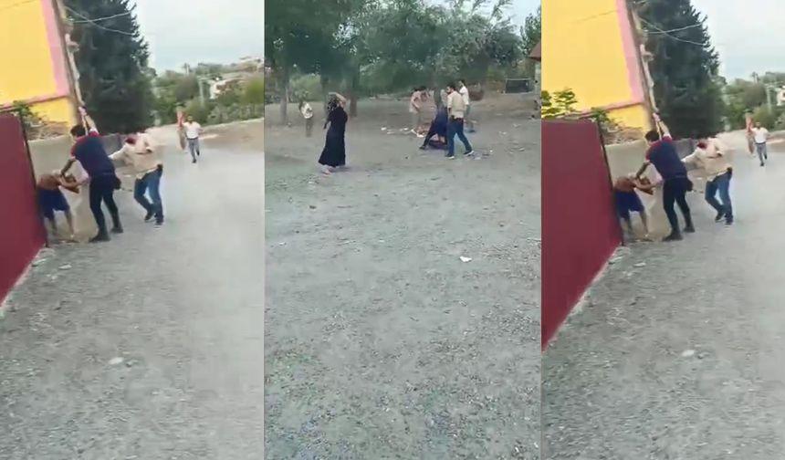 Hapis cezasıyla aranan şahsı yakalayan polislere taşla saldırdılar, o anlar kamerada