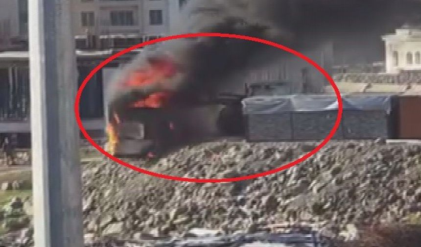 Alevlerin arasına dalan operatör, konteyneri uçurumdan yuvarladı