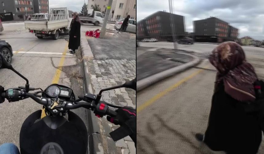 Yoğun trafikte karşıya geçemeyen yaşlı kadının imdadına duyarlı sürücü yetişti