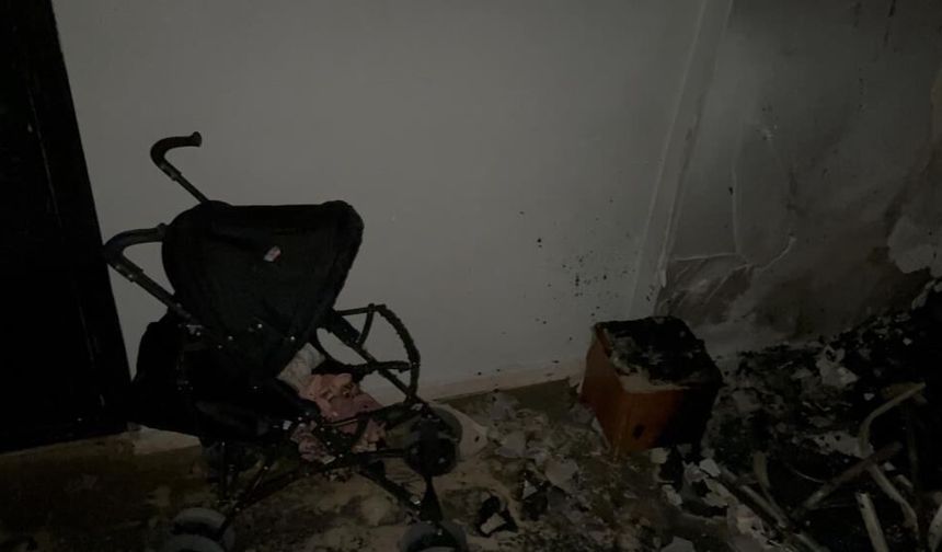 Eskişehir’de apartman girişinde çıkan yangında 2 kişi dumandan etkilendi