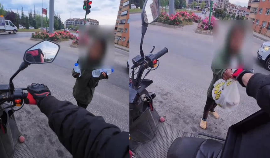Eskişehir'de gönülleri ısıtan an: Kurye teslim edilmeyen paketi çocuklara verdi